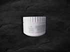 A white 250ml jar of Peruda body balm.
