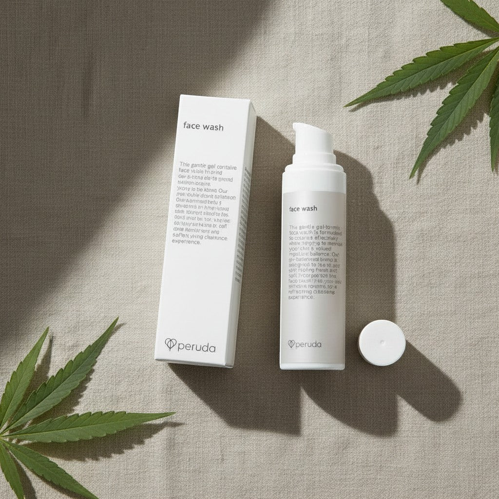 peruda skincare face wash bottle and box on linen fabric with green leaves