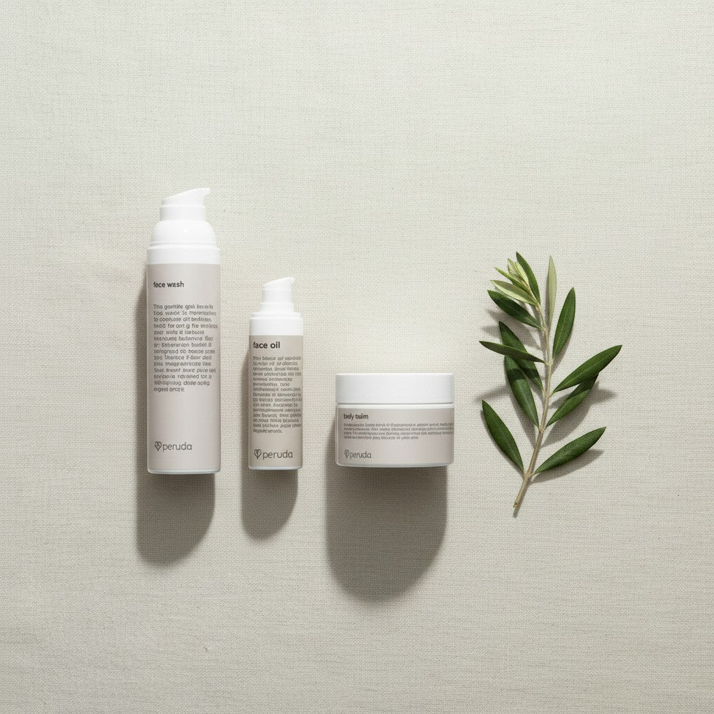 peruda skincare Sensitive Skin Ritual set featuring face wash, face oil, and body balm with a green olive branch.